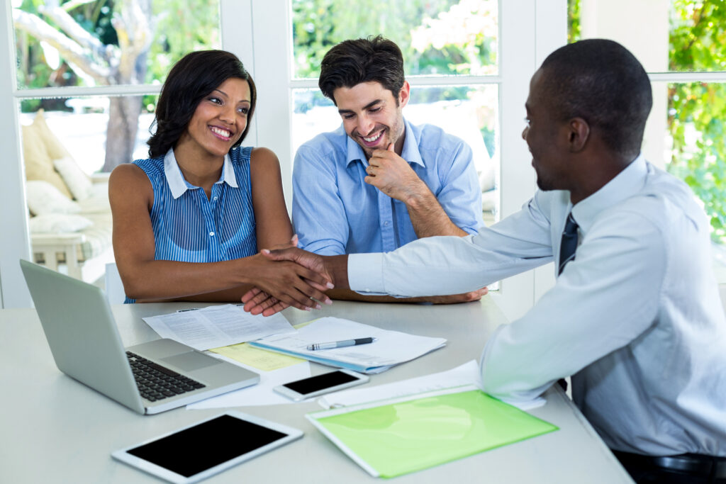 A junior sales rep with clients